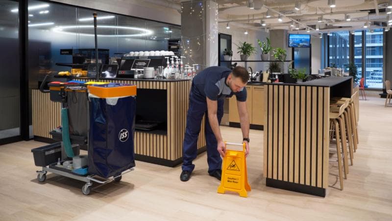 Cafe putting up warning sign trolley included